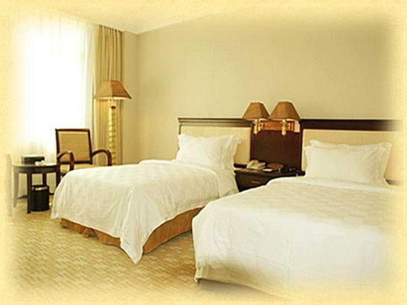 Yutong Hotel Kanton Zimmer foto