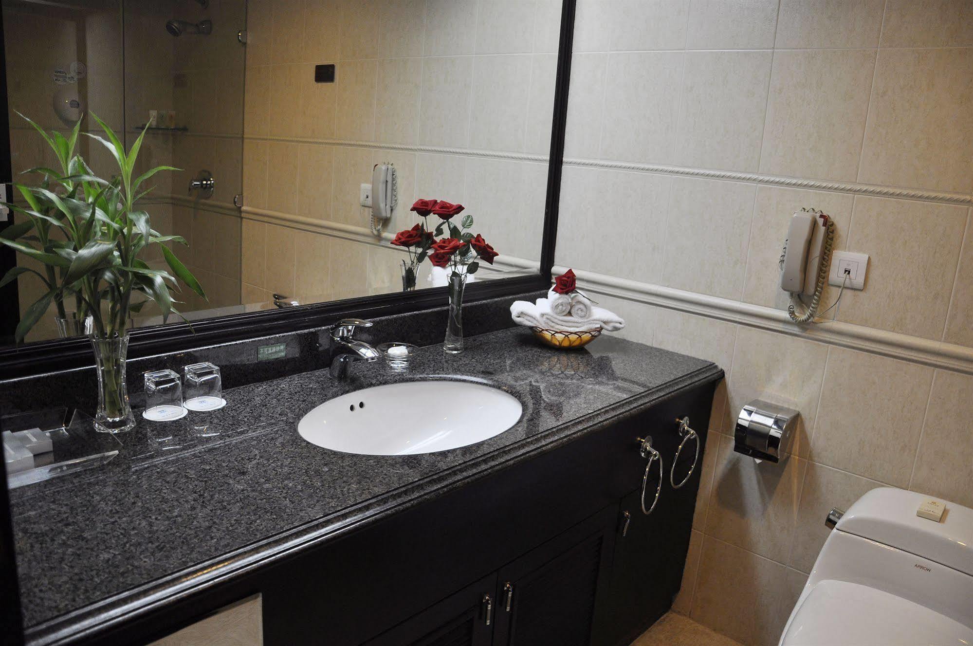Yutong Hotel Kanton Zimmer foto